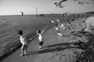 Children playing on Alabama Gulf Coast shoreline